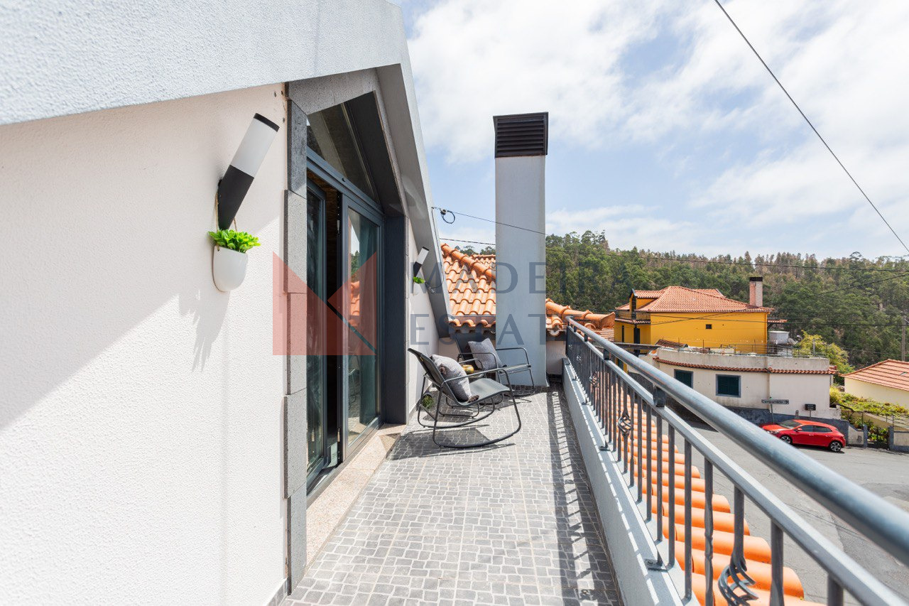 Balcony with Scenic View of Nature and City in Ribeira Brava Balcony with a view of nature and the city in Ribeira Brava, Madeira, Portugal