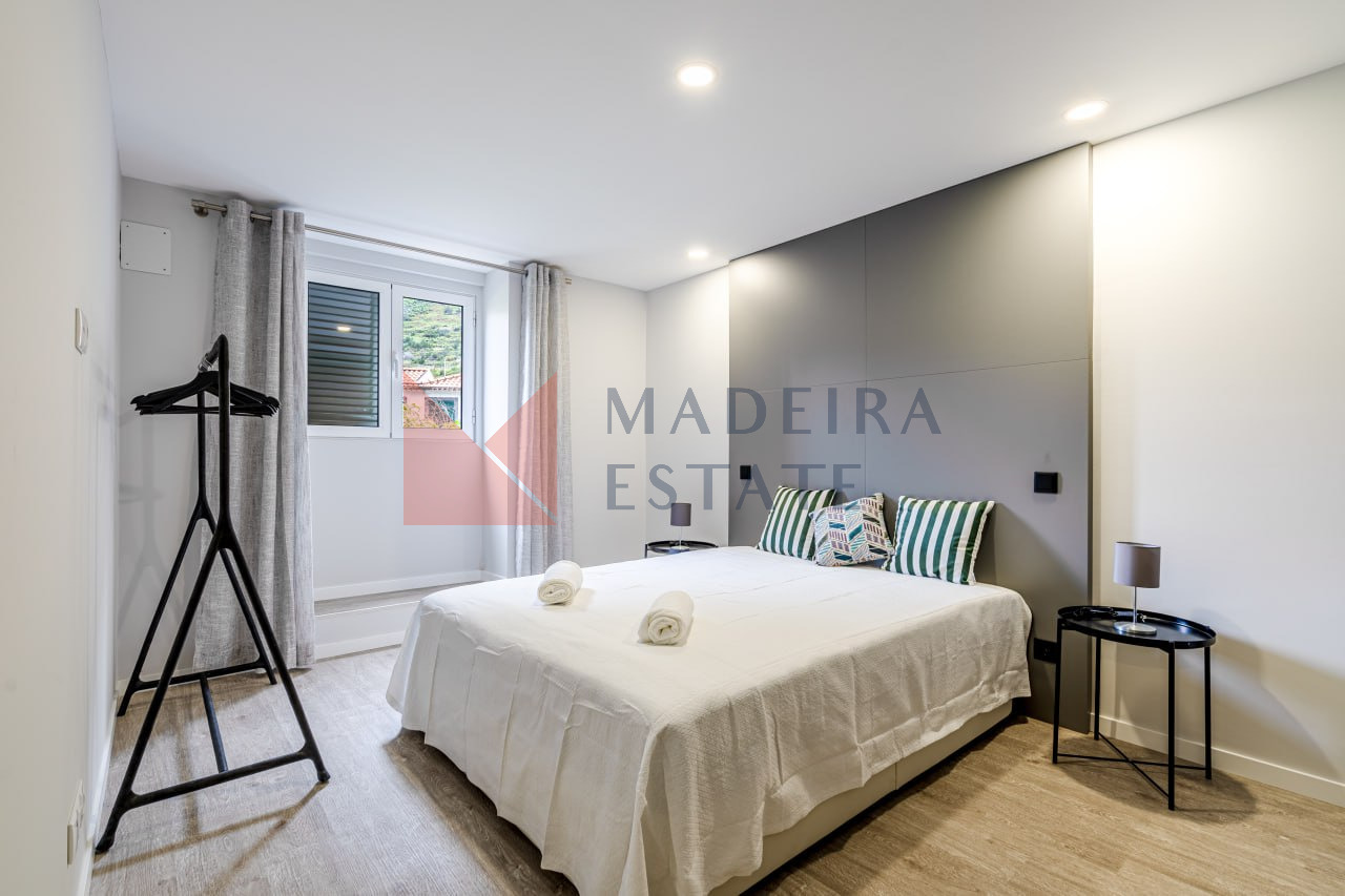 Modern bedroom with double bed at JMF House, São Vicente, Madeira