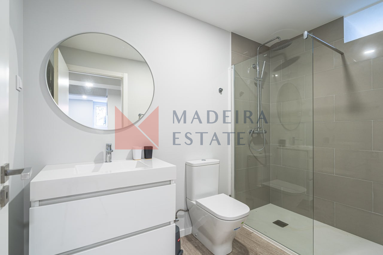 Modern bathroom with gray tones at JMF House, São Vicente, Madeira