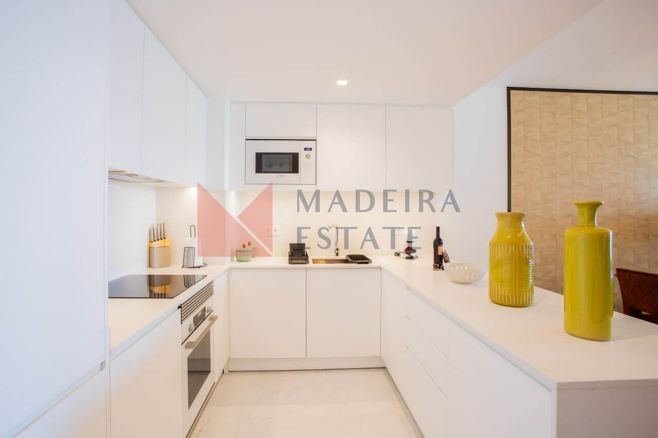 Fully equipped modern kitchen in short-term rental apartment in Funchal