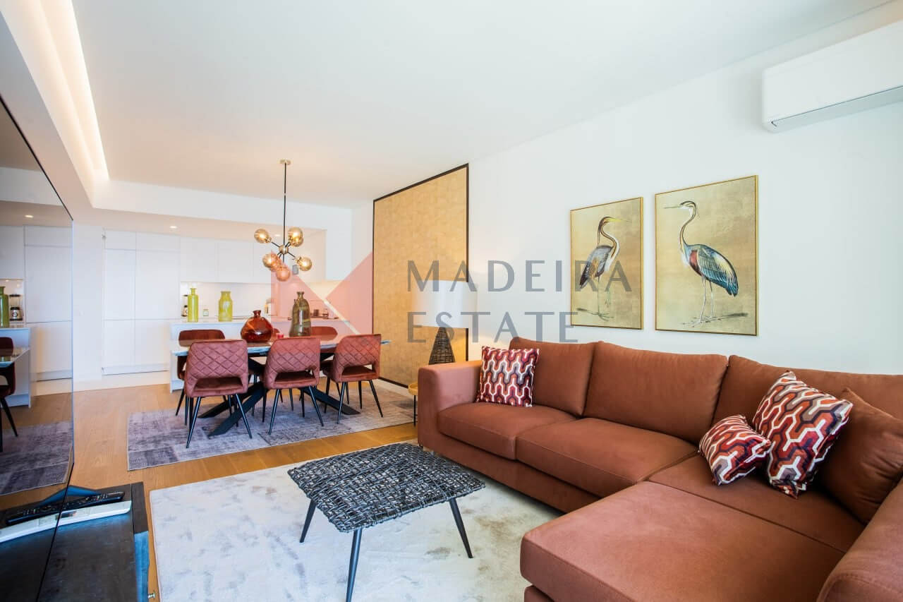 Spacious and modern living room with ocean view at Satoshi Ocean View apartment in Funchal