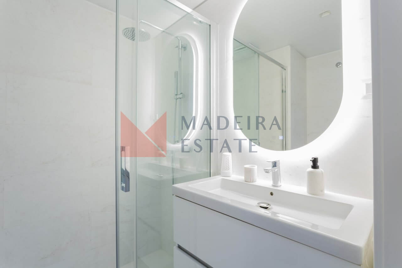 Stylish bathroom with modern fixtures in short-term rental apartment in Funchal