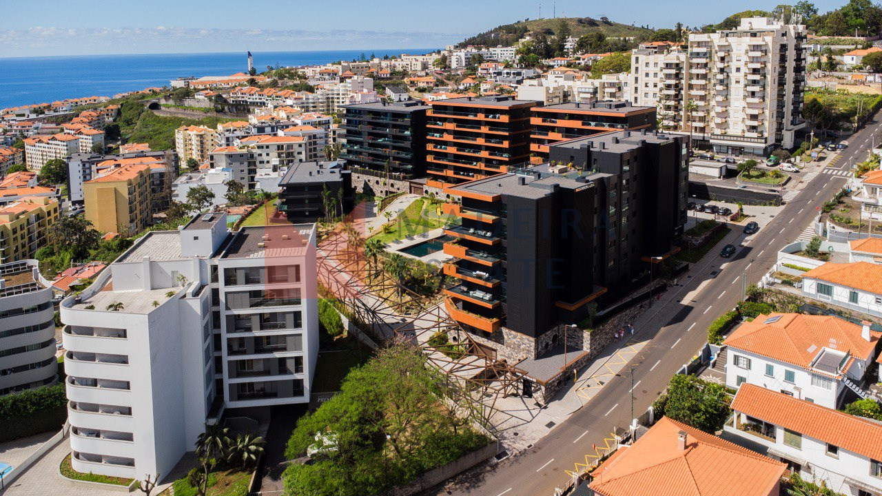 Quiet street and apartment building in Funchal, Madeira Street view with residential building in Funchal, Madeira