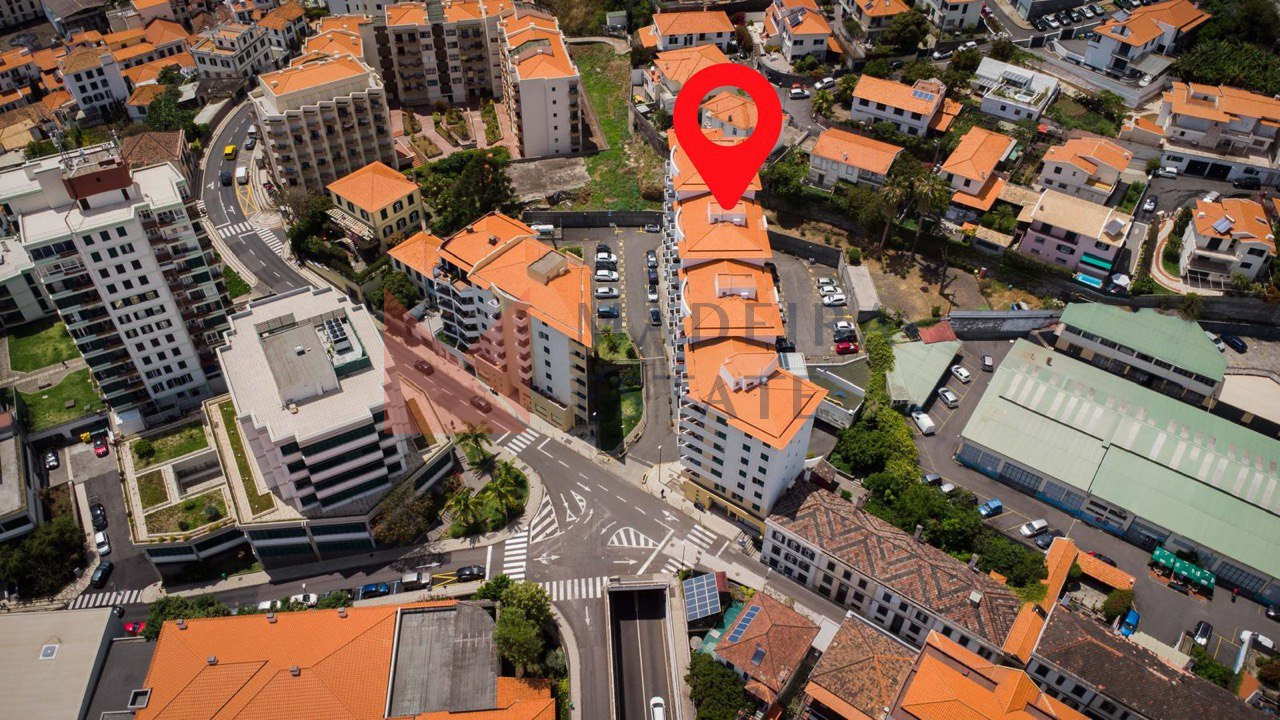 Alternate Aerial View Highlighting JMF Apartment Location – Funchal, Madeira Aerial view of building from a different angle with JMF Apartment location marked – Madeira short-term rental